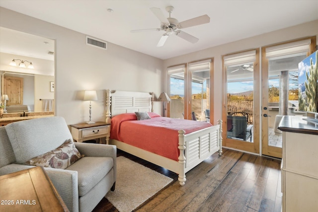 bedroom with access to exterior, dark hardwood / wood-style floors, ceiling fan, and ensuite bathroom