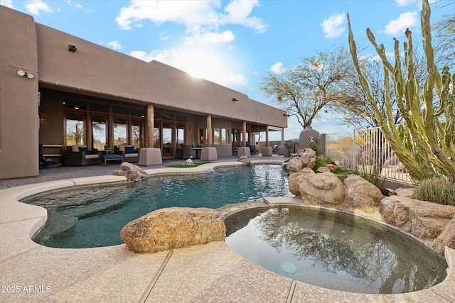 view of pool with a patio and an outdoor hangout area