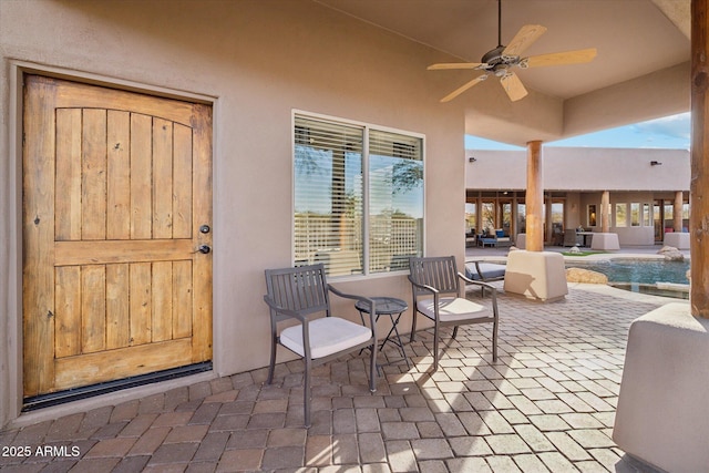 view of patio / terrace with ceiling fan