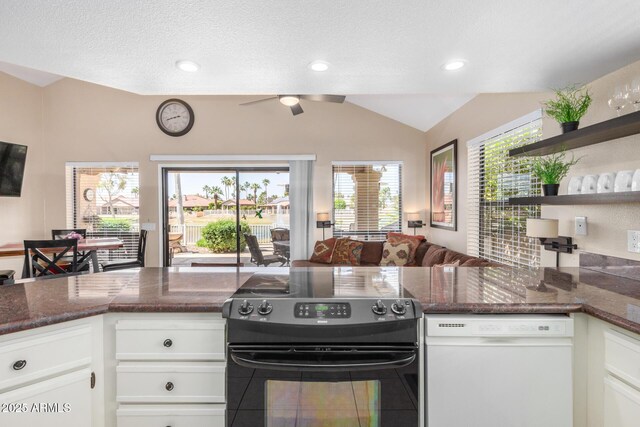 kitchen featuring white dishwasher, electric range, open shelves, white cabinetry, and open floor plan
