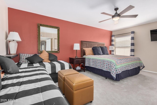 bedroom featuring carpet floors, ceiling fan, and baseboards