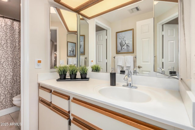 full bath featuring vanity, toilet, tile patterned floors, a shower with shower curtain, and visible vents