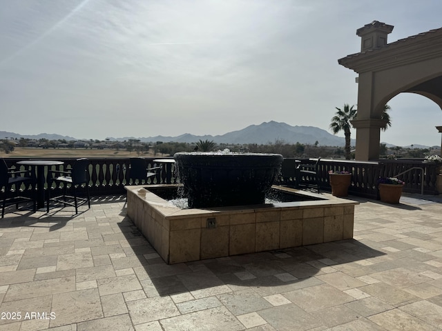 view of patio featuring a mountain view