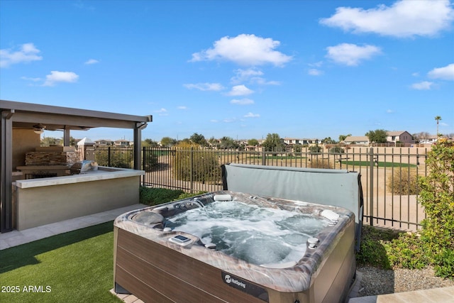 view of patio featuring a hot tub