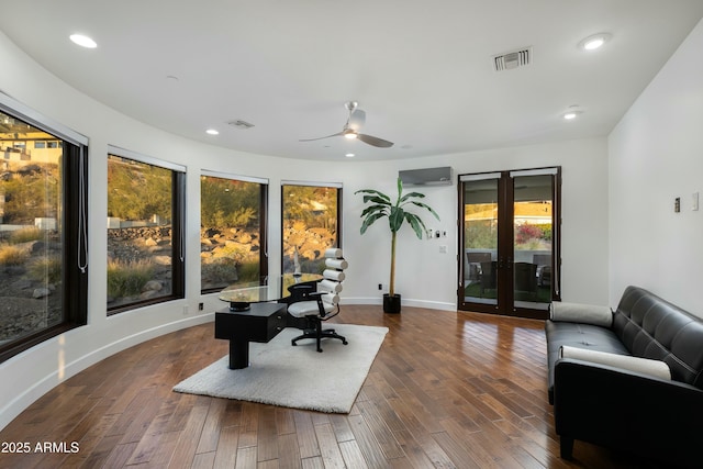 office area featuring recessed lighting, dark wood-style flooring, visible vents, baseboards, and french doors