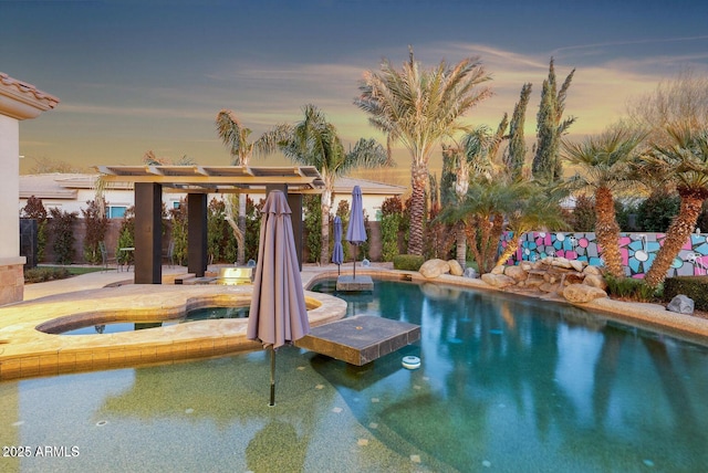 815 E County Down Dr, Chandler, AZ 85249 - pool at dusk with an in ground hot tub and a fenced in pool