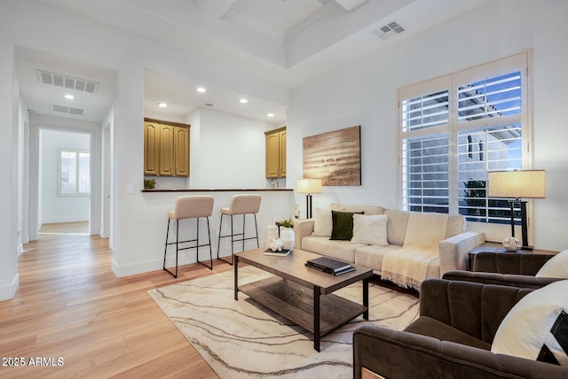 815 E County Down Dr, Chandler, AZ 85249 - living room featuring light wood-type flooring, baseboards, visible vents, and recessed lighting