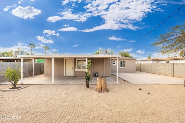 rear view of house featuring a patio