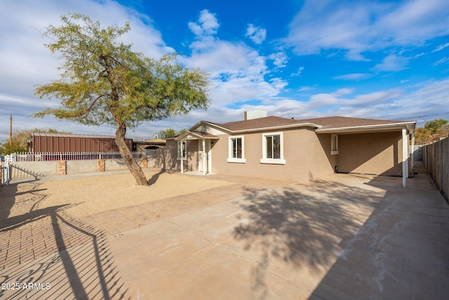 rear view of house with a patio area