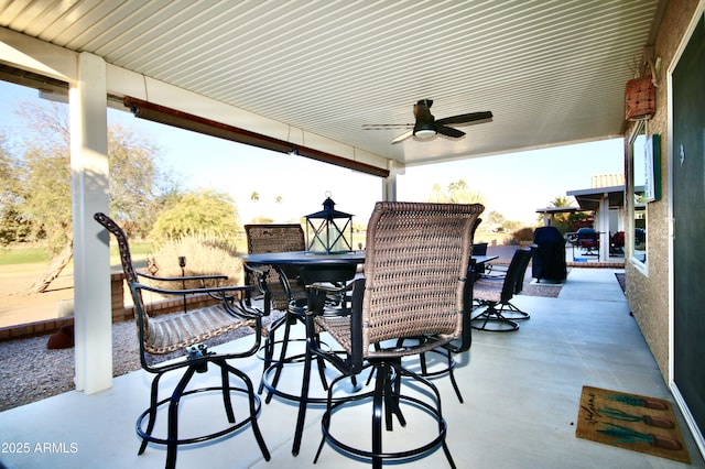 view of patio / terrace featuring ceiling fan