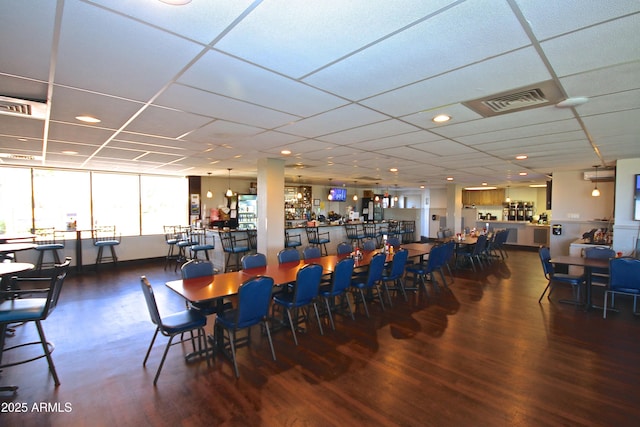 dining space featuring dark hardwood / wood-style flooring