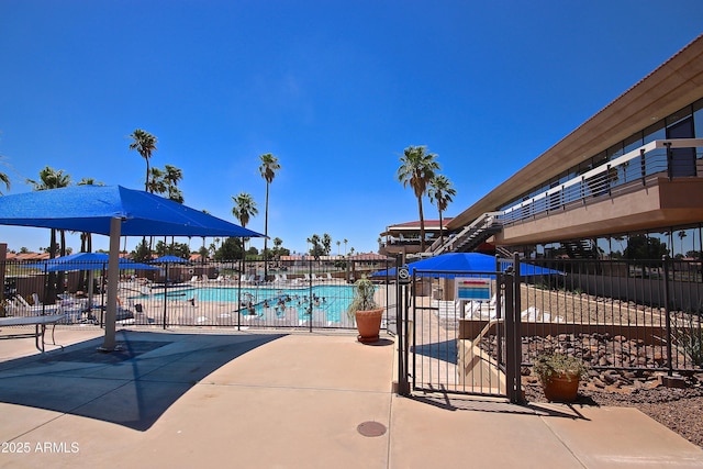 view of pool featuring a patio