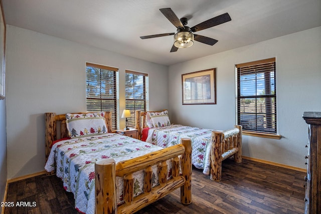 2295 Bison Ranch Trl, Overgaard, AZ 85933 - bedroom featuring multiple windows, wood finished floors, and ceiling fan