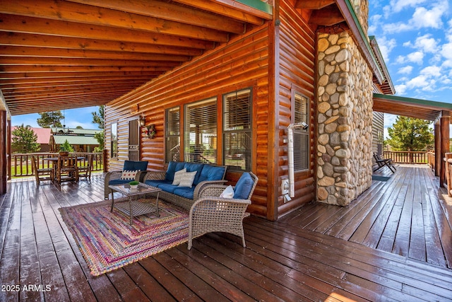 2295 Bison Ranch Trl, Overgaard, AZ 85933 - wooden deck featuring an outdoor living space and outdoor dining area