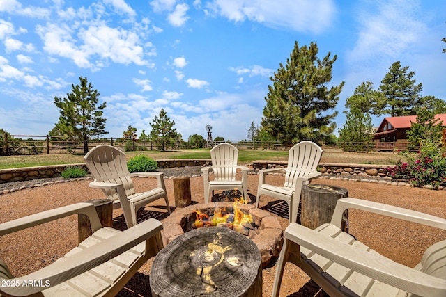 2295 Bison Ranch Trl, Overgaard, AZ 85933 - view of patio / terrace with an outdoor fire pit