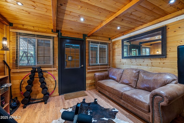 2295 Bison Ranch Trl, Overgaard, AZ 85933 - living room with a wooden ceiling with exposed beams, wooden walls, wood finished floors, and recessed lighting