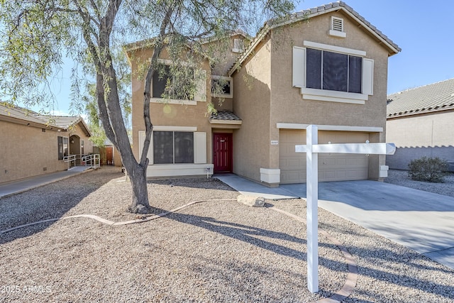 view of front of property featuring a garage