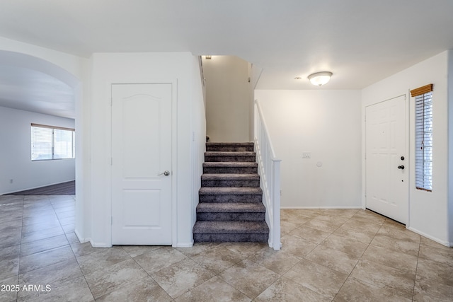 entryway featuring light tile patterned flooring