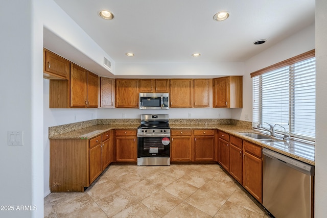 kitchen with stainless steel appliances and sink