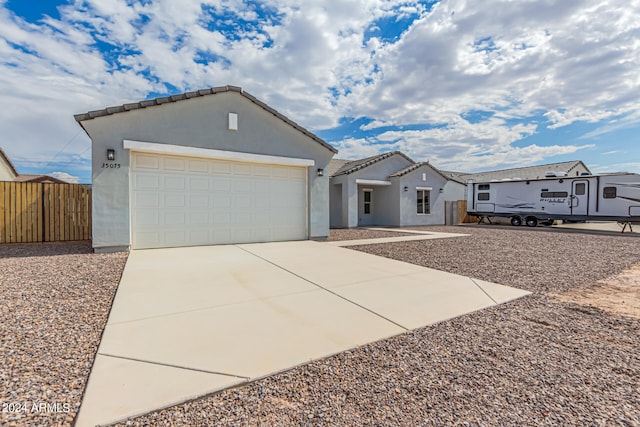 view of front of property featuring a garage