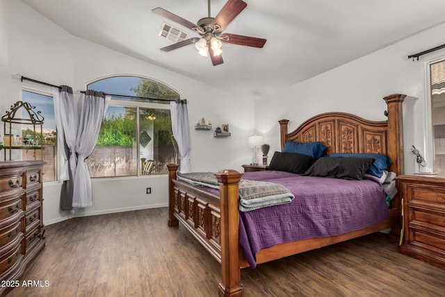bedroom featuring visible vents, a ceiling fan, and wood finished floors
