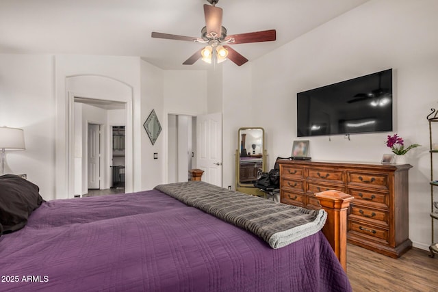 bedroom with ceiling fan and wood finished floors