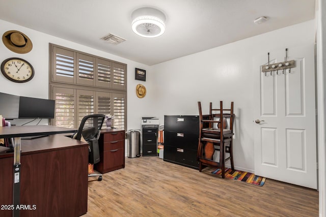 office featuring visible vents and light wood-type flooring