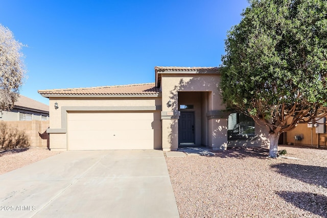 mediterranean / spanish-style home featuring a garage