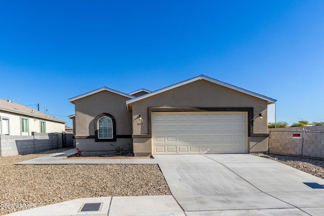 single story home with a garage