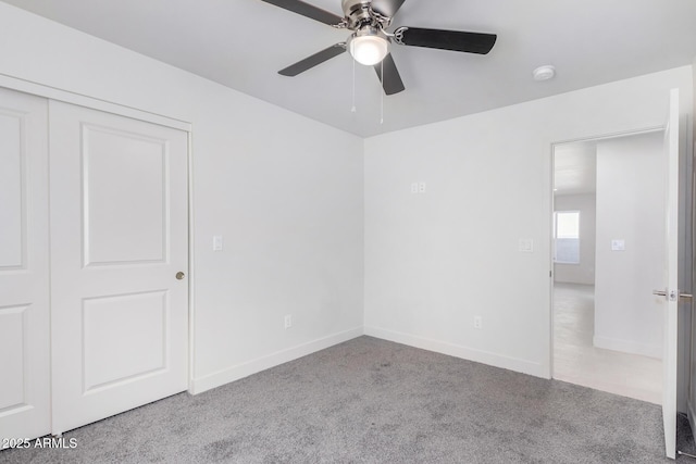 empty room with light carpet and ceiling fan