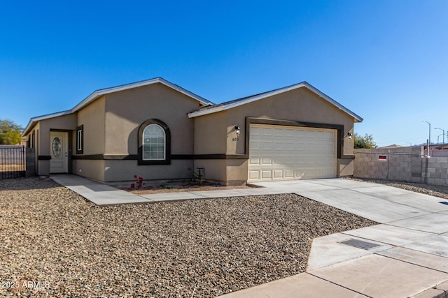 ranch-style home with a garage