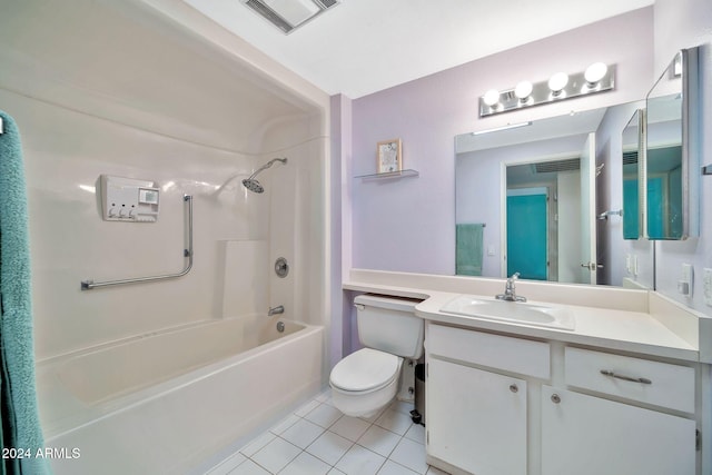 full bathroom featuring vanity, tile patterned flooring, washtub / shower combination, and toilet