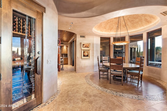 dining room featuring a tray ceiling