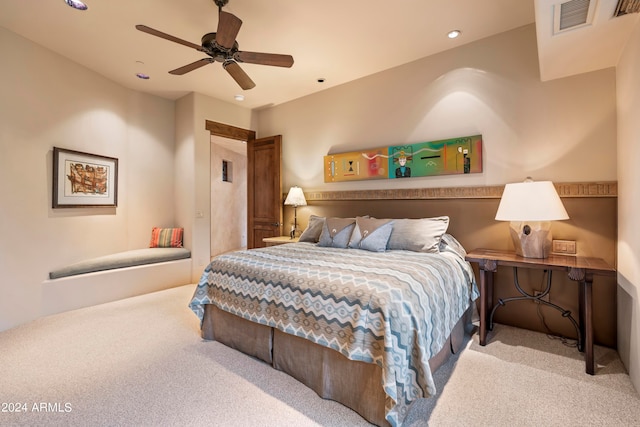 carpeted bedroom featuring ceiling fan