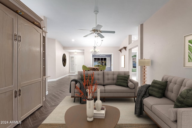 living room featuring ceiling fan with notable chandelier