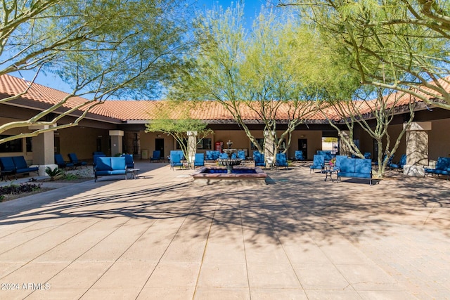 back of property with a patio area