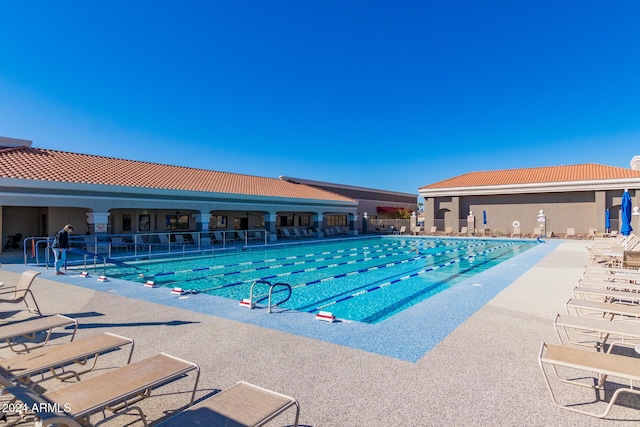 view of pool featuring a patio area