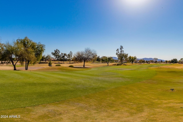 surrounding community with a mountain view