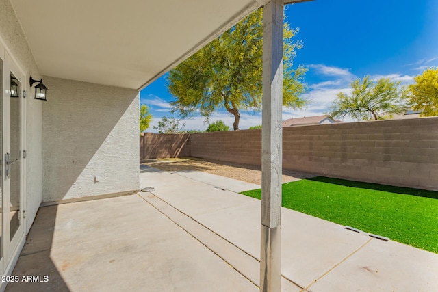 view of patio with a fenced backyard