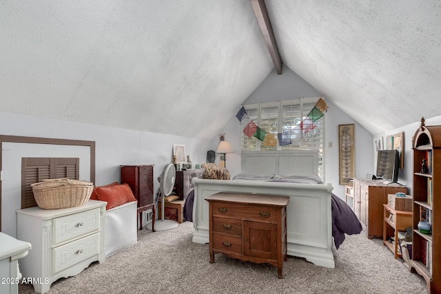 carpeted bedroom with a textured ceiling and lofted ceiling with beams