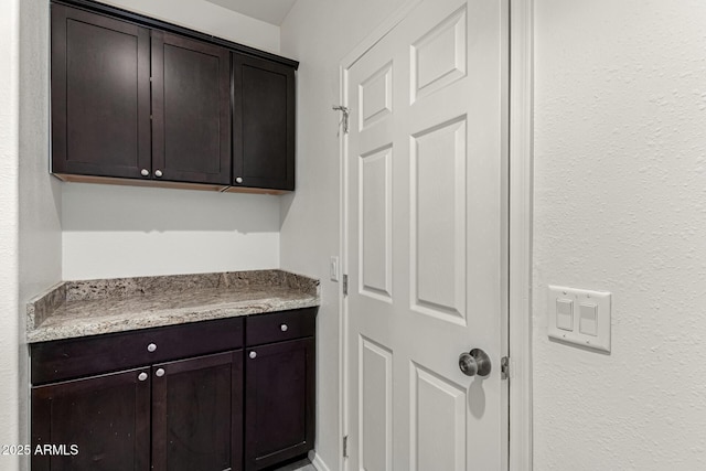 interior space featuring dark brown cabinets