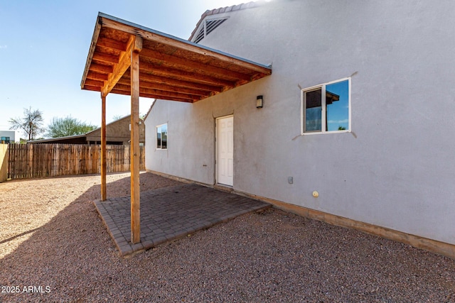 view of patio featuring fence