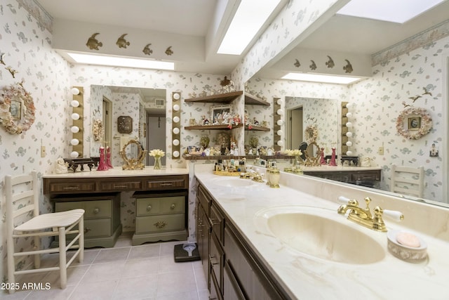 bathroom with tile patterned flooring and vanity