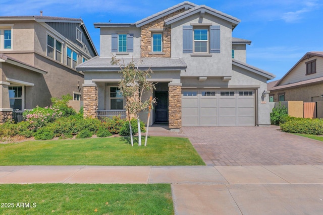 view of front of property featuring a garage, stone siding, a tile roof, decorative driveway, and stucco siding