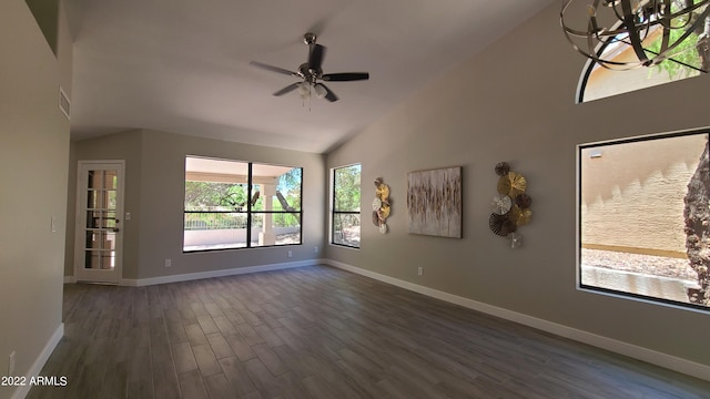 unfurnished living room featuring dark hardwood / wood-style floors, high vaulted ceiling, and ceiling fan