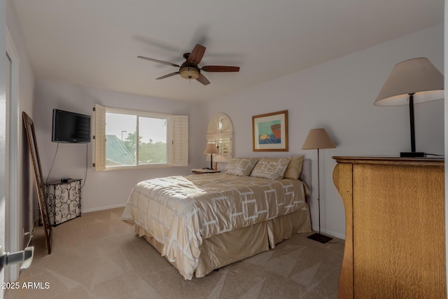 9921 E Doubletree Ranch Rd, Scottsdale, AZ 85258 - bedroom featuring light carpet and ceiling fan