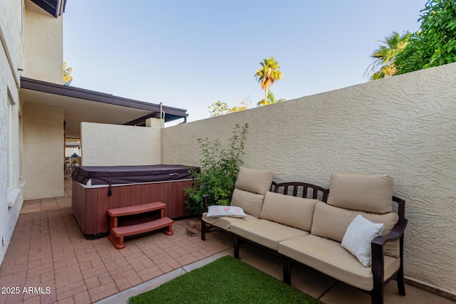 9921 E Doubletree Ranch Rd, Scottsdale, AZ 85258 - view of patio / terrace featuring a hot tub and an outdoor hangout area