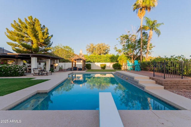 9921 E Doubletree Ranch Rd, Scottsdale, AZ 85258 - view of swimming pool featuring a fenced backyard, a patio area, and a diving board