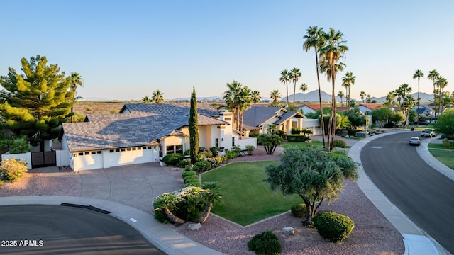 9921 E Doubletree Ranch Rd, Scottsdale, AZ 85258 - view of front of house with a garage, concrete driveway, stucco siding, a residential view, and a gate
