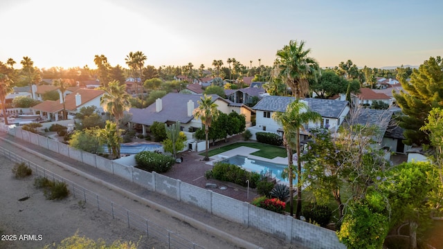 9921 E Doubletree Ranch Rd, Scottsdale, AZ 85258 - aerial view at dusk of a residential view and view of pool area